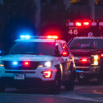 American Police Car and Emergency truck with Blue and red lights.