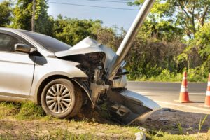 a sedan crashed into power pole closeup