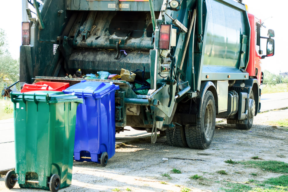 Garbage collector of the urban waste recycling service at work.