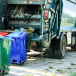 Garbage collector of the urban waste recycling service at work.