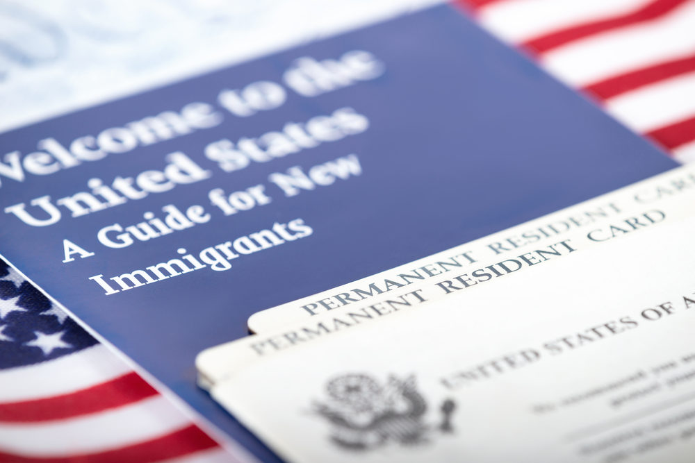 Permanent Resident Cards with an immigration welcome package