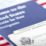 Permanent Resident Cards with an immigration welcome package