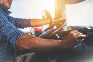 Trucker Preparing For Long Haul Shipping.