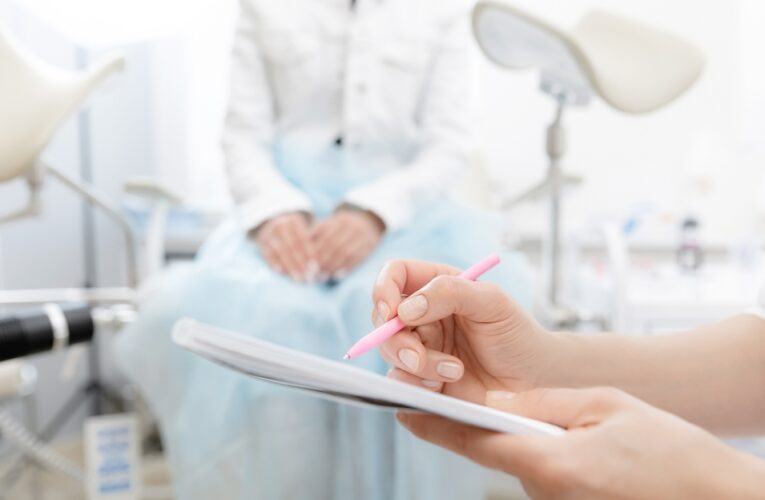 a young woman at gynecologist office during consultation