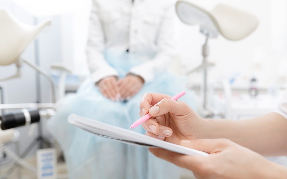 a young woman at gynecologist office during consultation