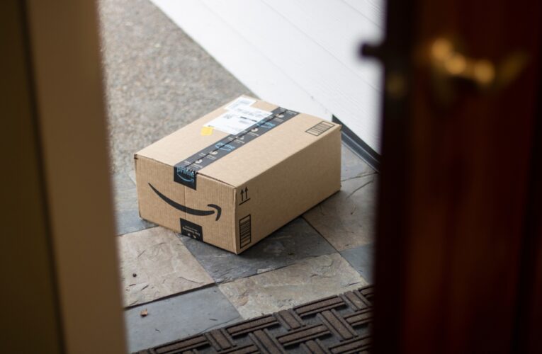 An Amazon Prime package delivered on a doorstep.