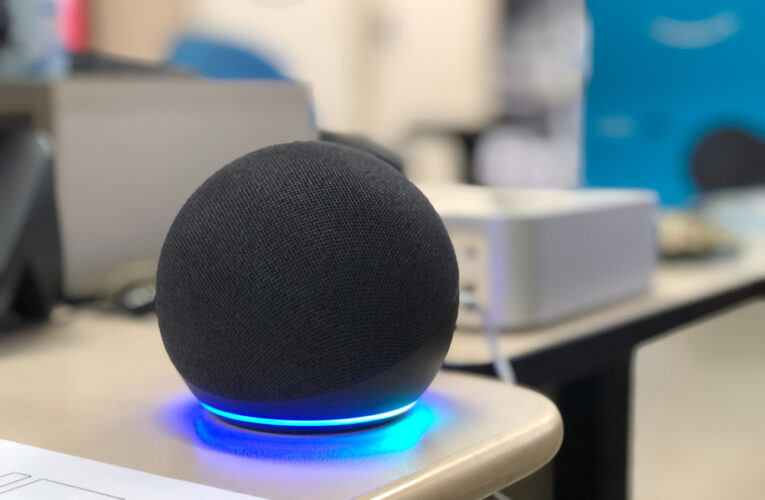 Closeup of Alexa Dot 4 virtual assistant on a desk